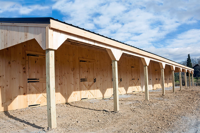 Construction:  Overhang Complete, Sections Together on Shed Row Horse Barn